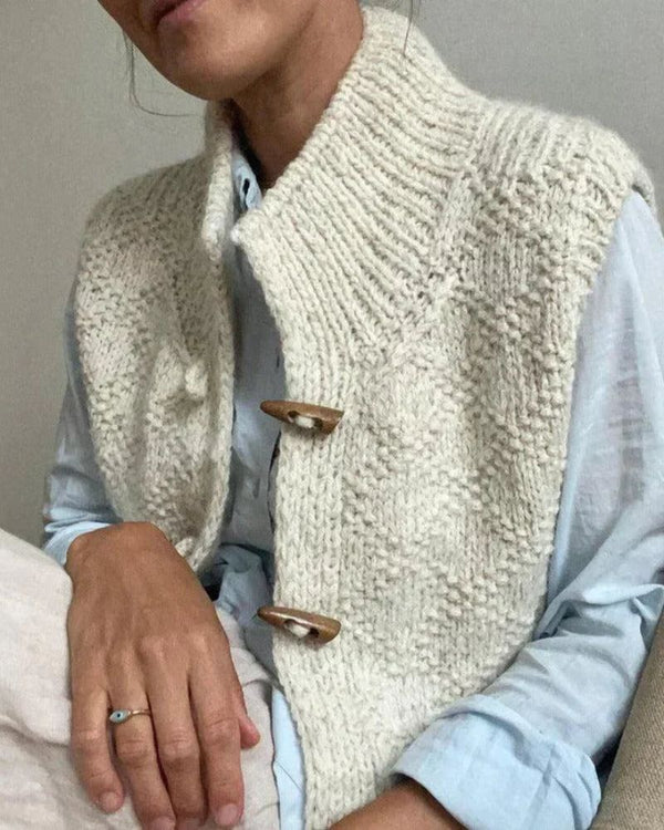 Eliane – Elegant ermeløs kåpe